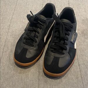 Puma Palermo, 8.5 size woman’s, Black and Gum sole Sneakers.